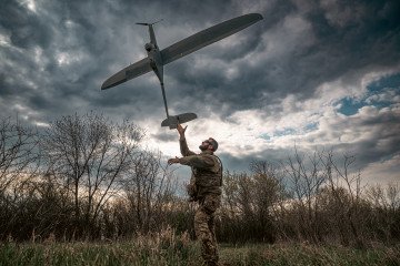 A Ukrainian soldier launches a Polish-made FlyEye reconnaissance drone during an operation in the Donetsk region. (Source: Getty Images) A Ukrainian soldier launches a Polish-made FlyEye reconnaissance drone during an operation in the Donetsk region. (Source: Getty Images)