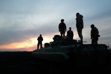 Ukrainian soldiers stand on a BMP-2 on the outskirts of Avdiivka, on February 14, 2024. (Source: Getty Images) Ukrainian soldiers stand on a BMP-2 on the outskirts of Avdiivka, on February 14, 2024. (Source: Getty Images)