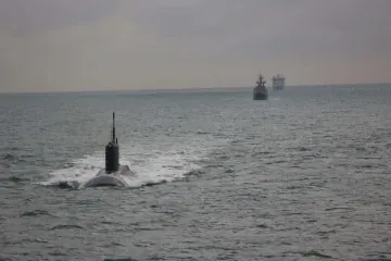 Illustrative image. Russian Kilo-class submarine Krasnodar, accompanied by the tug Altay, moves through the English Channel, December 11, 2025. (Source: Royal Navy)