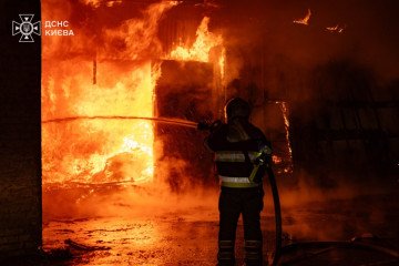 A firefighter battles a blaze after a Russian overnight missile and drone attack on Kyiv, July 26, 2026. (Source: State Emergency Service of Ukraine) A firefighter battles a blaze after a Russian overnight missile and drone attack on Kyiv, July 26, 2026. (Source: State Emergency Service of Ukraine)