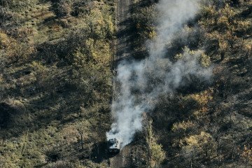Illustrative image. A Russian BMP was hit by a Ukrainian FPV drone. Smoke rises after the ammunition ignites at the frontline near Bakhmut on October 24, 2023, in Bakhmut, Ukraine.