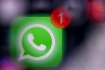 This photo shows the logo of US instant messaging software Whatsapp displayed on a smartphone's screen. illustrative photo. (Source: Getty Images)