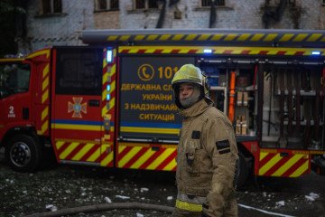 A Ukrainian emergency responder at the site of a Russian jet-powered drone strike on September 25, 2026. Illustrative image. A Ukrainian emergency responder at the site of a Russian jet-powered drone strike on September 25, 2026. Illustrative image.
