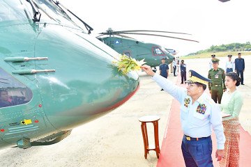 A Myanmar military official performs a ceremonial blessing on a newly delivered Russian Mi-38 helicopter during the official handover in Naypyidaw, November 2025. (Source: myawady)
