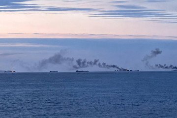 Several vessels burn in the Sea of Azov, with thick columns of smoke rising above the water following reported Ukrainian drone strikes. (Photo: Open source) Several vessels burn in the Sea of Azov, with thick columns of smoke rising above the water following reported Ukrainian drone strikes. (Photo: Open source)