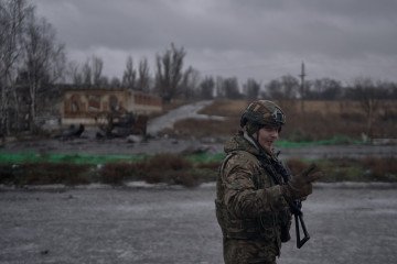 Ukrainian serviceman on the road between Druzhkivka and Kostyantynivka, Donetsk region, amid ongoing Russian artillery and FPV drone threats near the frontline, February 13, 2026. (Source: Getty Images)