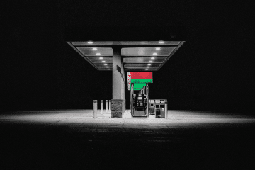 An illustration of gas station with the flag of Belarus. (Source: Oleksandr Manukians/UNITED24 Media)
