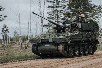 Latvian CVR(T) tracked armored vehicle during field operations, equipped with camouflage and light armament. (Source: Ministry of Defense of Latvia)