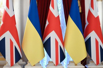 The flags of Great Britain and Ukraine are being displayed before a joint press conference of former UK Prime Minister Rishi Sunak and President of Ukraine Volodymyr Zelensky in Kyiv, Ukraine, on January 12, 2024. (Source: Getty Images)