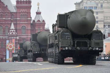Russian Yars RS-24 intercontinental ballistic missile systems roll through Red Square during a military parade in Moscow. (Source: Getty Images) Russian Yars RS-24 intercontinental ballistic missile systems roll through Red Square during a military parade in Moscow. (Source: Getty Images)