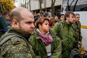 Russian recruits gather outside a military processing center as drafted men said goodbye to their families before departing from their town in Moscow, Russia, on October 06, 2022. Russian recruits gather outside a military processing center as drafted men said goodbye to their families before departing from their town in Moscow, Russia, on October 06, 2022.