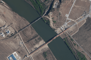 Satellite imagery displays the new road bridge built parallel to the existing rail-only Friendship Bridge across the Tumen River. (Source: The Guardian / Ukrainian human rights organization Truth Hounds)