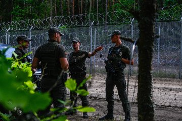 Illustrative image. Lithuanian border guard officers speak to each other during a patrol along the Belarus–Lithuania border on July 10, 2023, in Dieveniskes, Lithuania. Illustrative image. Lithuanian border guard officers speak to each other during a patrol along the Belarus–Lithuania border on July 10, 2023, in Dieveniskes, Lithuania.