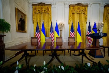 A signing table remains in the East Room after Ukrainian President Volodymyr Zelenskyy leaves the White House early on February 28, 2025 in Washington, DC. (Source: Getty Images)