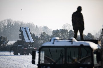 A course participant stands on a truck in front of a Patriot launcher during a training course for Ukrainian soldiers on the Patriot air defense system at a Bundeswehr base. A course participant stands on a truck in front of a Patriot launcher during a training course for Ukrainian soldiers on the Patriot air defense system at a Bundeswehr base.