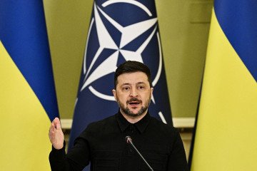 Ukraine’s President Volodymyr Zelensky gestures as he delivers a press conference with Secretary General of NATO following their meeting in Kyiv on February 3, 2026, amid the Russian invasion of Ukraine. (Source: Getty Images)