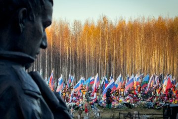 A monument a serviceman standing in front of the letters Z and V at a massive burial site of Russian soldiers in the rural Volga region of Kostroma October 20, 2025. (Photo: Getty Images)