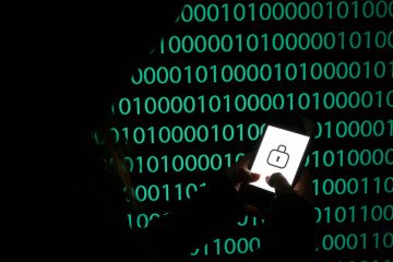 Illustrative image: a padlock symbol is displayed on mobile phone screen. (Source: Getty Images)