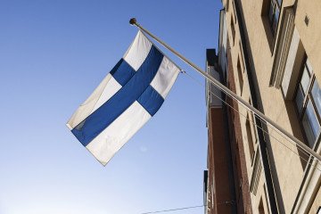 The Finnish flag flutters during the parliamentary election day in Helsinki on April 2, 2023. (Source: Getty Images)