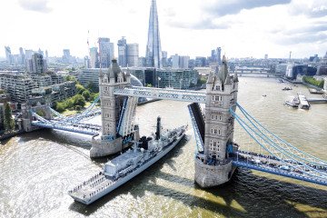 HMS Sutherland passes Tower Bridge on the River Thames on May 12, 2025, in London, England. (Source: Getty Images)