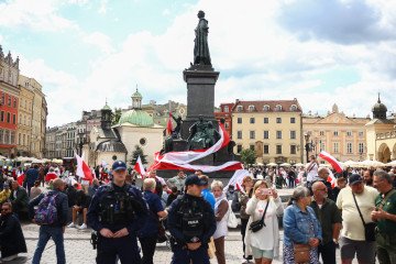 Anti-Ukrainian demonstration, while a few meters away, members of the Ukrainian diaspora celebrate the Independence Day of Ukraine in Krakow, Poland, on August 24, 2025. (Source: Getty Images)