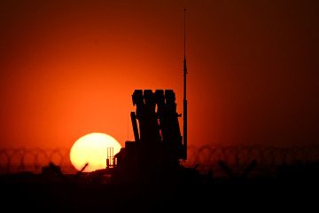 A Patriot air defense system positioned at Poland’s Rzeszow-Jasionka airport, a key logistics hub for Ukraine, during sunset on March 6, 2025. (Source: Getty Images)