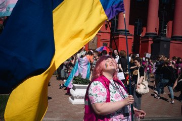 Participants hold Ukrainian and LGBTQ+ flags during a Pride event in central Kyiv. (Source: UNITED24 Media) Participants hold Ukrainian and LGBTQ+ flags during a Pride event in central Kyiv. (Source: UNITED24 Media)
