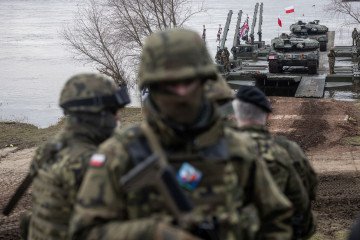 Polish soldiers and Leopard 2A4 tanks take part in the NATO DRAGON-24 military exercise in Korzeniewo, northern Poland, March 4, 2024. (Source: Getty Images)