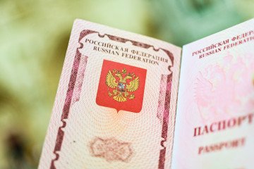 The emblem of the Russian Federation drawn in the passport. Illustrative image. (Photo: Getty Images)