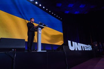 President Volodymyr Zelenskyy addressing government officials, star ambassadors, and international partners at the annual UNITED24 summit in Kyiv.