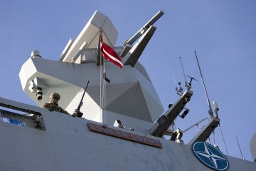 A NATO emblem on the Danish Absalon-class frigate Esbern Snare (F342), part of the Standing NATO Maritime Group, moored at the passenger port in Riga, Latvia, on October 30, 2022. (Source: Getty Images)