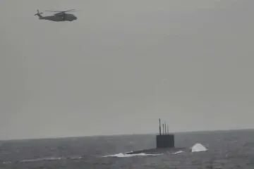 Russia Flexes Naval Muscle Near UK as Submarine Surfaces in Broad Daylight