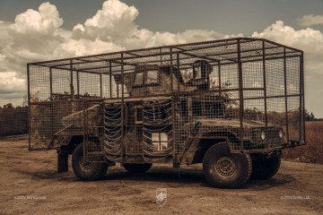 US Military Fits HMMWVs and HEMTT Trucks With Ukraine-Style Anti-Drone Cages A HMMWV with additional protection in service with the 12th Special Operations Brigade Azov of the National Guard of Ukraine. (Photo: Azov Brigade Press Service)