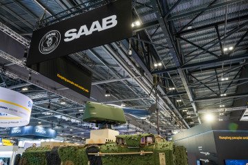A vehicle covered with the Barracuda Mobile Camouflage System and fitted with a Giraffe 1X radar on the Saab AB stand at the Defence and Security Equipment International  2025 exhibition in London, UK, on September 10, 2025. (Source: Getty Images)