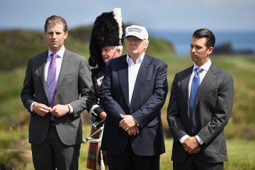 US President Donald Trump stands with his two sons Donald Trump junior and Eric Trump on June 24, 2016 in Ayr, Scotland. (Source: Getty Images) US President Donald Trump stands with his two sons Donald Trump junior and Eric Trump on June 24, 2016 in Ayr, Scotland. (Source: Getty Images)