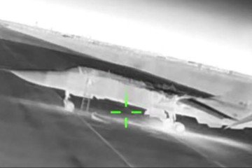 Russian Su-24 bomber moments before Ukrainian drone strike, Crimea. (Source: HUR)