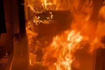 Burning communication equipment reportedly damaged during an Atesh sabotage operation in the Moscow region. (Source: Atesh/Telegram)