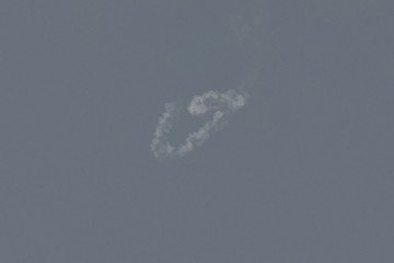 Smoke rises over Dubai following a reported rocket interception on February 28, 2026, after Iran vowed to “respond decisively” to Israeli and US strikes. (Source: Getty Images)