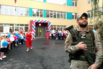 A Russian soldier stands outside a school during an occupation-run ceremony for children in Kherson region. (Photo: open source) A Russian soldier stands outside a school during an occupation-run ceremony for children in Kherson region. (Photo: open source)