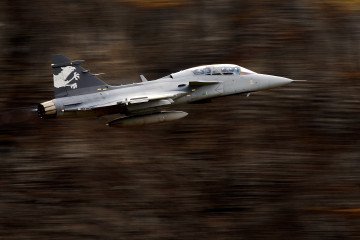 A Swedish Saab Gripen F fighter performs during a flight demonstration of the Swiss Air Force over Axalp in the Bernese Oberland, on October 11, 2012. (Source: Getty Images)