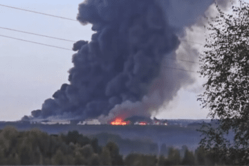 A massive plume of black smoke rises over the Wildberries fulfillment center in Aleksin, Tula region, following an overnight drone strike. (Source: Getty Images) A massive plume of black smoke rises over the Wildberries fulfillment center in Aleksin, Tula region, following an overnight drone strike. (Source: Getty Images)