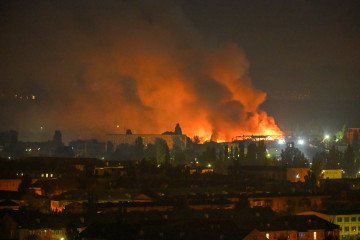A fire burns in Kyiv following a Russian ballistic missile strike during the overnight attack on August 5, 2026. (Source: Getty Images)