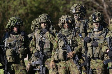 Estonia Prepares Strategic Plan for 30-Day Autonomy and Deep Strikes into Enemy Territory Troops look on as Prince Harry smiles as he takes part in a NATO Military Training Exercise 'Steadfast Javelin One' on May 17, 2014 in Otepaa, Estonia. (Source: Getty Images)