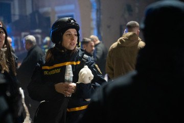 A psychologist of the State Emergency Service of Ukraine responds at the site of a Russian missile strike on residential buildings on December 30, 2023 in Kharkiv, Ukraine. (Photo by Gwara Media/Global Images Ukraine via Getty Images) First to support W Ukraine's First Psychological Support Providers