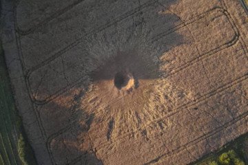 Crater left by a suspected Russian Kh-101 air-launched cruise missile near Tarnawa-Kolonia, southeastern Poland. (Photo: Open source)