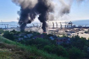 Thick black smoke rises above the port of Russian-occupied Mariupol following reported explosions on June 6, 2026. (Source: Exilenova+)