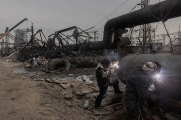 Workers repair damage at Kyiv’s Darnytska power plant after Russian air strikes on February 4, 2026. (Photo: Getty Images)