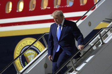 US President Donald Trump walks off Air Force One after arriving at Harry Reid International Airport on August 04, 2026, in Las Vegas, Nevada. US President Donald Trump walks off Air Force One after arriving at Harry Reid International Airport on August 04, 2026, in Las Vegas, Nevada.