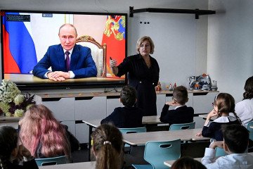 Pupils of a secondary school listen to Russia’s President Vladimir Putin’s address at the first day of the new school year in Moscow on September 1, 2025. (Source: Getty Images) Pupils of a secondary school listen to Russia’s President Vladimir Putin’s address at the first day of the new school year in Moscow on September 1, 2025. (Source: Getty Images)