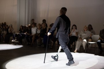 A Ukrainian veteran from the Azov Brigade presents a look from the JULIYA KROS SS2027 RECONSTRUCTION collection during Ukrainian Fashion Week in Kyiv on September 4, 2026. (Source: Vic Bakin/UNITED24 Media) A Ukrainian veteran from the Azov Brigade presents a look from the JULIYA KROS SS2027 RECONSTRUCTION collection during Ukrainian Fashion Week in Kyiv on September 4, 2026. (Source: Vic Bakin/UNITED24 Media)